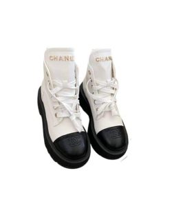 Chanel Cc Lace Up Boots Black And White