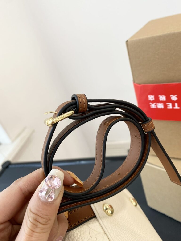 Louis Vuitton Montsouris Backpack Empreinte White And Brown 25Cm - Image 4