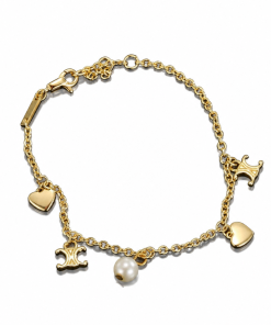 Celine Coeur Charm Bracelet In Gold-Tone Brass And Resin Pearl
