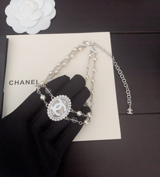 Chanel Double-Strand Pearl And CC Logo Necklace - Image 6