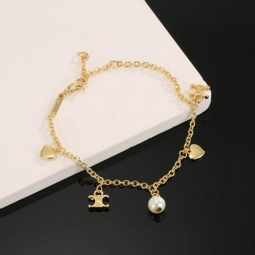 Celine Coeur Charm Bracelet In Gold-Tone Brass And Resin Pearl - Image 2