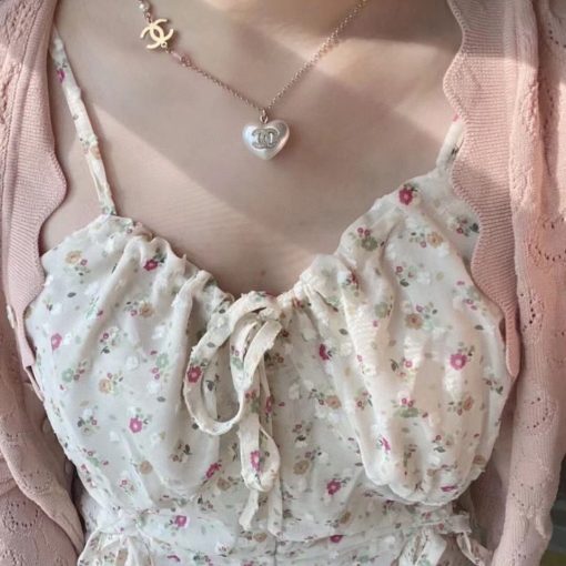 Chanel Gold-Tone CC Heart Resin Pearl Necklace - Image 4