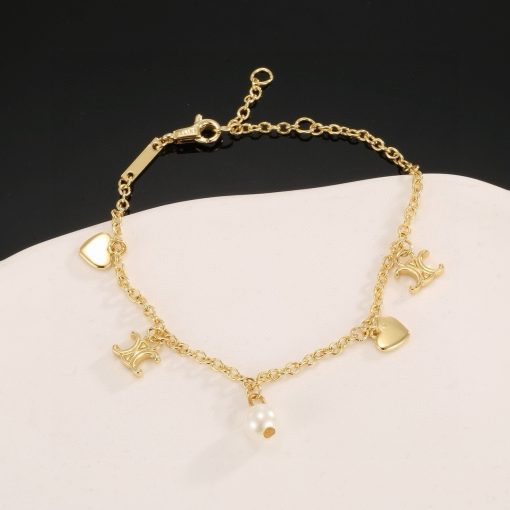 Celine Coeur Charm Bracelet In Gold-Tone Brass And Resin Pearl - Image 3