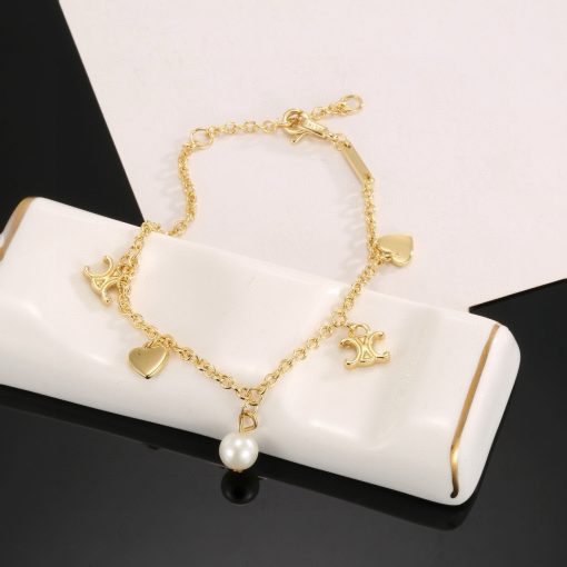 Celine Coeur Charm Bracelet In Gold-Tone Brass And Resin Pearl - Image 4