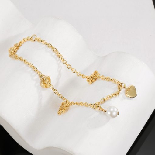 Celine Coeur Charm Bracelet In Gold-Tone Brass And Resin Pearl - Image 5