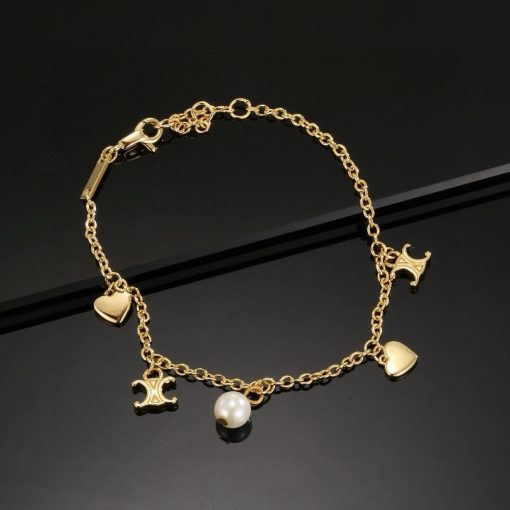 Celine Coeur Charm Bracelet In Gold-Tone Brass And Resin Pearl - Image 7